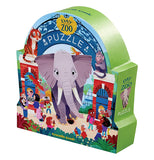 "Day at the Zoo" 48 piece puzzle in its blue and green rounded box with design of people visiting the zoo, a giant arch along the top and a giant elephant taking up the middle of the picture..
