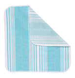 The blue and white striped dishcloth with a corner folded over to show the back