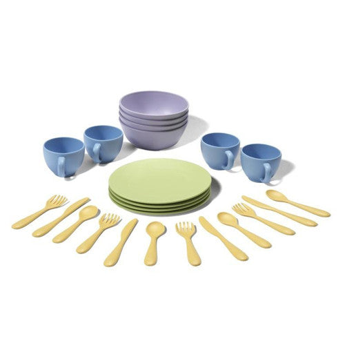 This child's play set includes four green plates, four blue cups, four purple bowls and fours sets of knives, spoons and forks