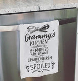 Grammy's kitchen dish towel hanging on the oven door.