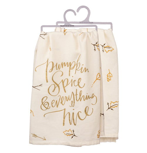 This dish towel has the words "Pumpkin Spice and everything nice" on it with leaves and an off-white background.