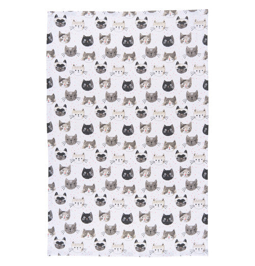 Cute kitty towel with a white background and black, white and grey cat faces.