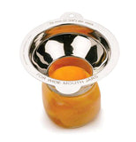 A stainless steel wide mouth canning funnel on a mason jar that is filled with multiple orange fruit slices.