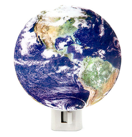 This night light is shaped to look like the earth, showing the North and South American continents.