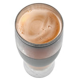 Freeze cooling pint glass with liquid in it.