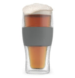 Freeze cooling pint glass clear with a grey piece to grip the glass.