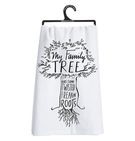A white dish towel with silhouette of a tree it says "My Family Tree Has Some Twisted Freakin' Roots."