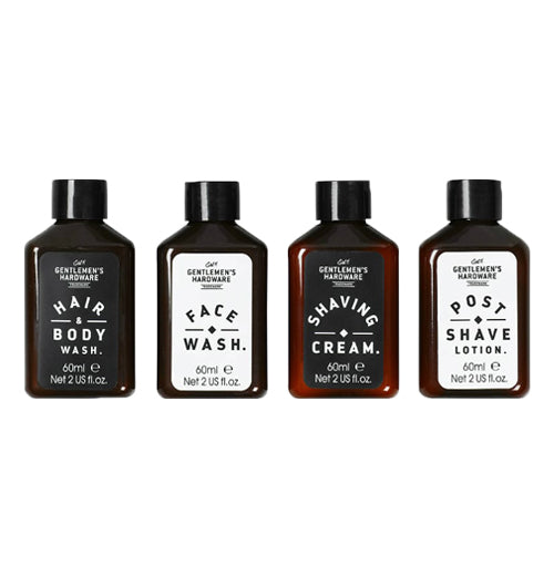 The hair wash, face wash, shaving cream, and post shave bottles are all shown together.