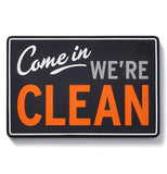 A magnet sign saying "Come in we're clean."