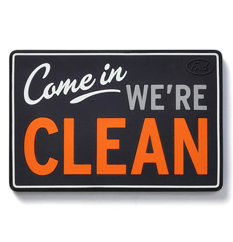 A magnet sign saying "Come in we're clean."