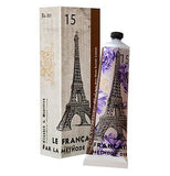 Shea Butter Lotion with the Eiffel tower illustrated on it. The lotion is placed next to it's packaging.. 