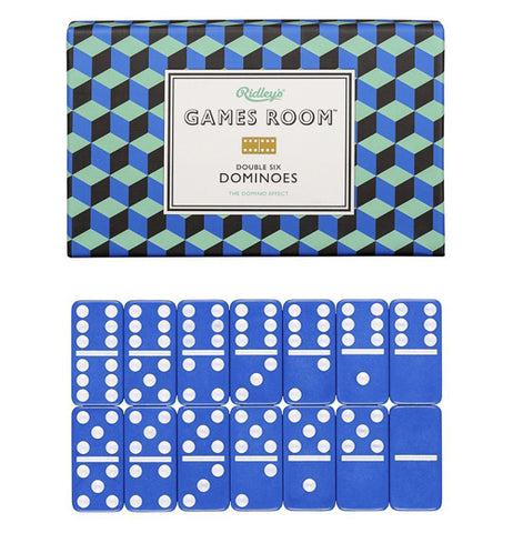 Set of blue and white dominoes placed together in front of green and blue box that reads "Games Room Double Six Dominoes" in black and white words.