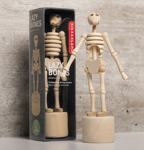 Kikkerland Lazybones skeleton displayed in and out of it's package.