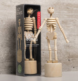 Kikkerland Lazybones skeleton displayed in and out of it's package.