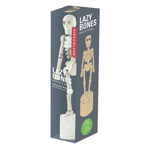 Kikkerland Lazybones skeleton in it's package.The package is gray with a clear plastic front that has the printed words "Lazy Bones" and shows the item and an illustration on the side.