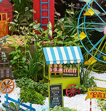 The Mini "Fair Fun" Sign sits with the other miniature fair sets outside the garden. 