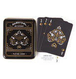 The black playing cards are shown outside lying next to their box against a white background.
