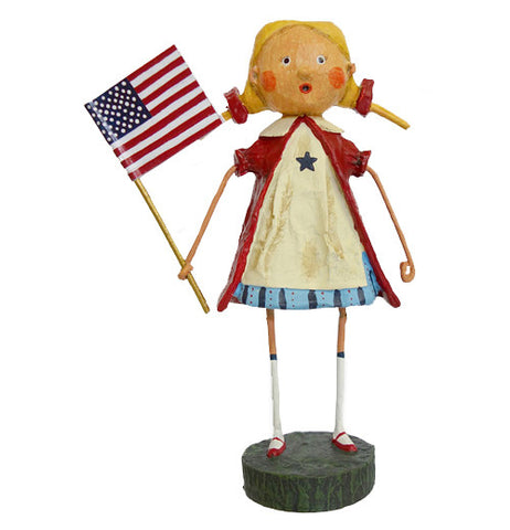 This figurine is of a girl named Gloria wearing a red, white, and blue dress while holding a red, white, and blue American flag.