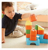 Kid Playing With Colorful Blocks