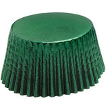 A green, shiny muffin cup is shown upside down.