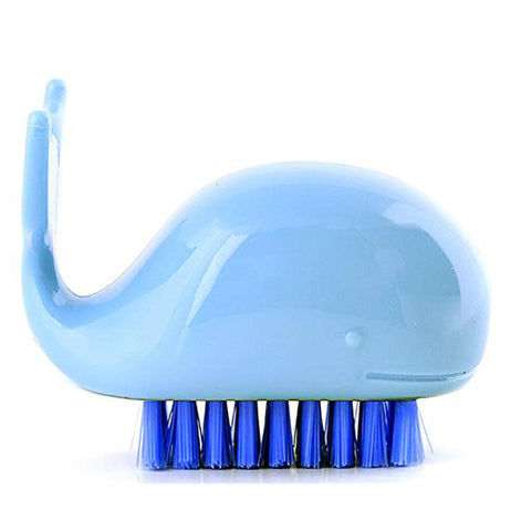 The light blue whale-shaped brush with dark blue bristles is shown individually.