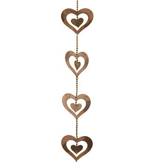 This string of hearts are made of steel with copper finish sprayed with gold paint. There is a heart within another heart.