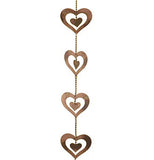 This string of hearts are made of steel with copper finish sprayed with gold paint. There is a heart within another heart.