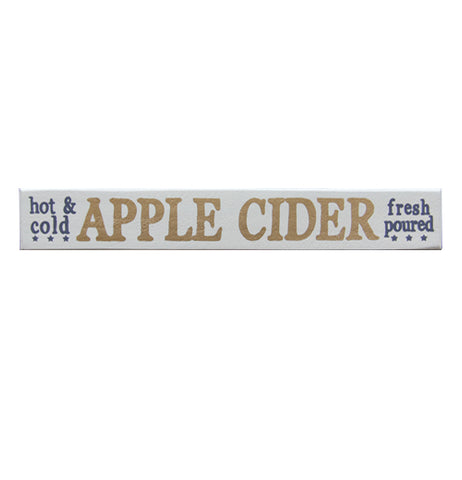 A white wooden sign with the phrases "Hot & Cold" "Apple Cider" and "Fresh Poured"