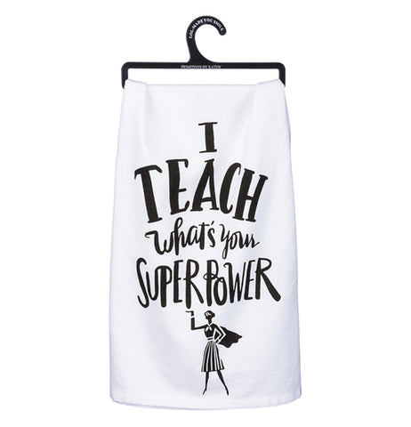 White dish towel with a super hero woman at the bottom, that says "I teach what's your superpower."