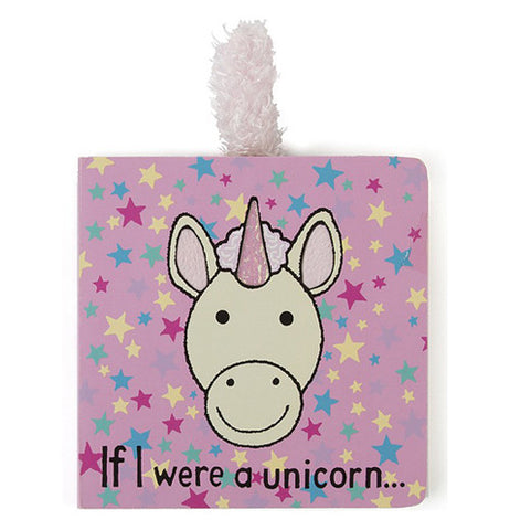 This small pink baby book has a unicorn's white and pink face on a pink background. The unicorn's horn is pink. Below the unicorn's head is the book's title, "If I Were A Unicorn" in black lettering. A small purple tail sticks out of the top of the book.