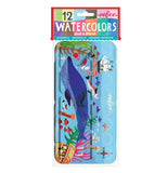 12 watercolors in a case that shows a picture of a whale and a ship with various other underwater creatures.
