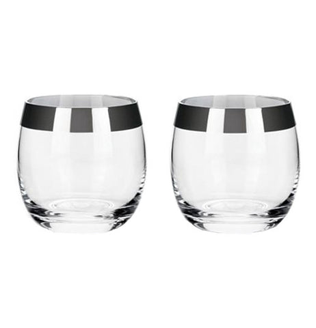  A pair of two glass-like Chrome Rim Crystal lays empty without drinks.