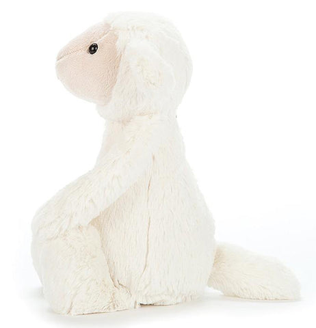 Side view of a bashful medium lamb.