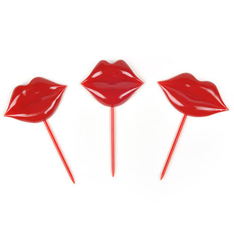 Three ruby red lip picks displayed.