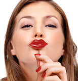 Woman displaying ruby red lip pick.