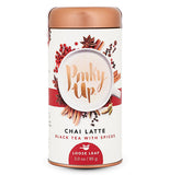 Red and White pinky up chai latte canister with a copper lid.