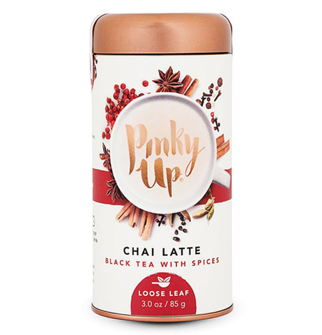 Red and White pinky up chai latte canister with a copper lid.