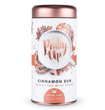 Pinky up Cinnamon Bun Loose Leaf Tea canister with a copper lid.