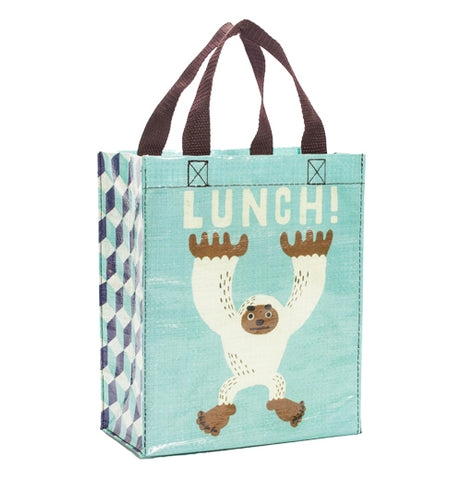 Turquoise bag with a yetty and the word "Lunch" printed on it.