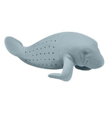 The close-up of a gray Manatee with holes in the bottom half containing small holes for use as a tea infuser. 