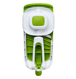 Green and white vegetable slicer folded for compact size.