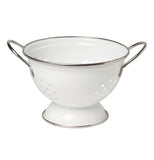 White colander with silver handles.