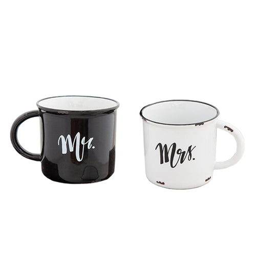 Two mugs are shown; one is black with a white interior and the word, "Mr." written on it in white lettering. The other is white with a black rim and the word, "Mrs." written on it in black lettering.