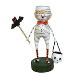The Mummy Boy wrapped in white tape with red bow holds a ghost candy on one hand and a bat wand on the other. 