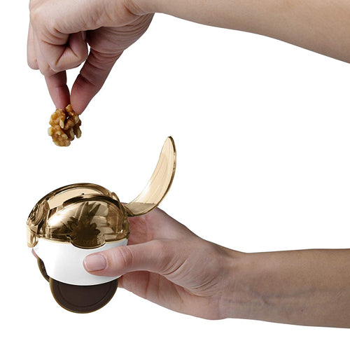 This nut zoom nut chopper, you put a nut into the top of the nut cracker and then shut the top