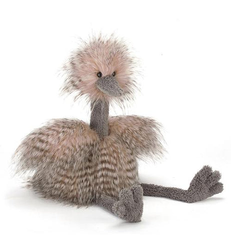 This Ostrich plushy is pink in color and has big grey legs and is in the sitting position.