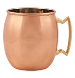 Copper mug that has a handle that is a cool shape.