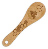 This Beechwood Spoon has a picture of a bee and a honeycomb etched into the wood.