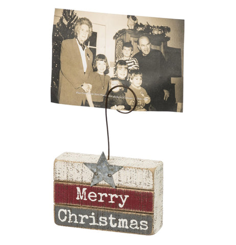 wood block picture frame that says "Merry Christmas" and holds a picture