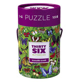 The "36 Butterflies" Puzzle with 100 pieces are in a green jungle-like canister with a purple lid. 
